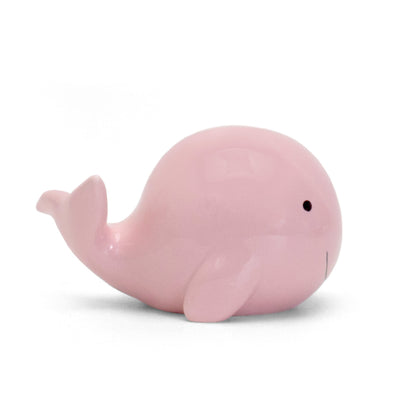 Another side angle of pink whale ceramic bank showing round shape and fins