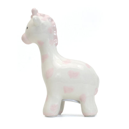 Left side view of pink spotted ceramic giraffe piggy bank