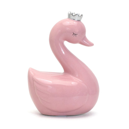 Close-up side view showing swan's wing details and coin slot