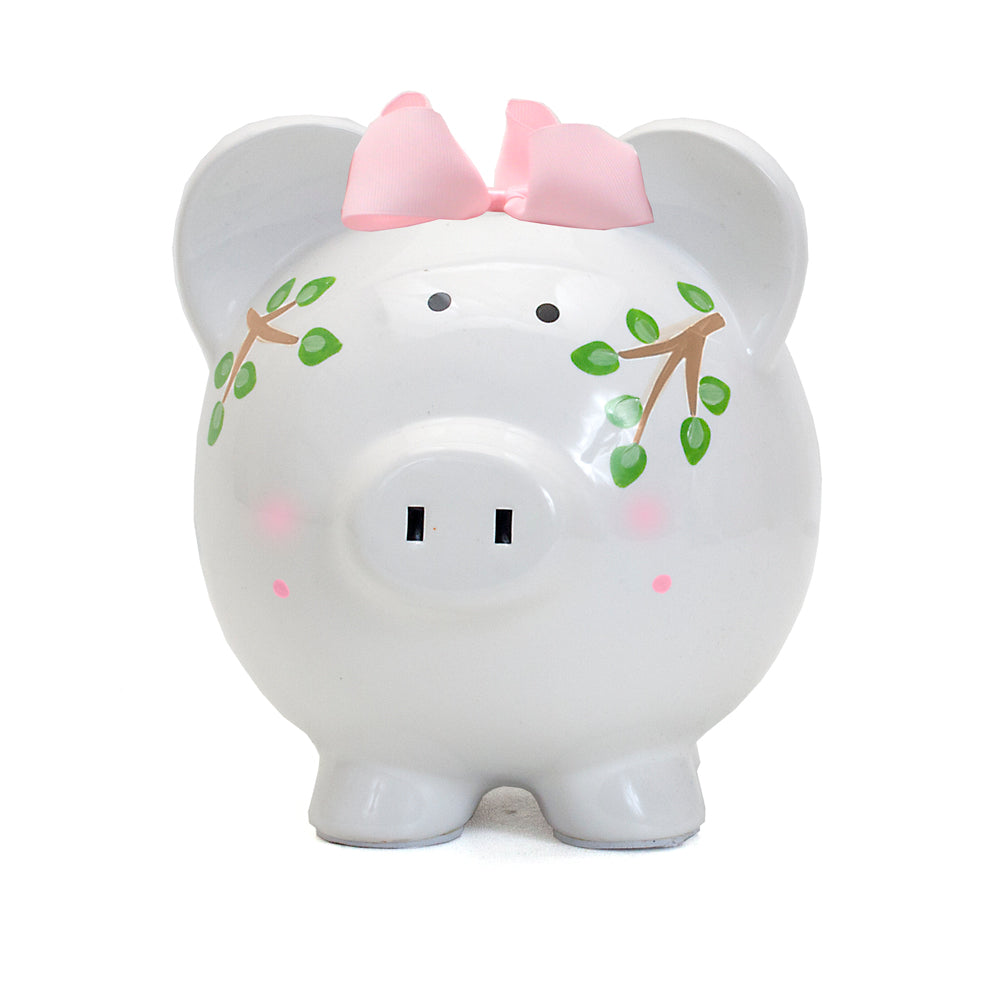 Front view of Pink Tropical Punch Piggy bank showing pig face and pink bow