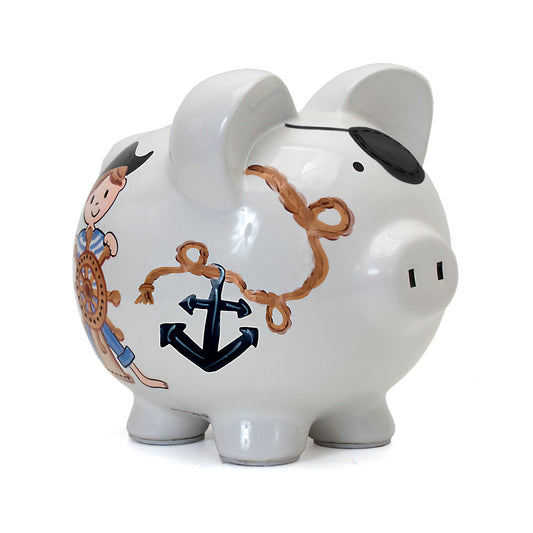 Side view of white ceramic piggy bank with pirate boy steering wheel anchor and rope design