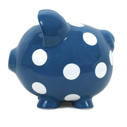Right side view of dark blue polka dot piggy bank with visible snout and ears