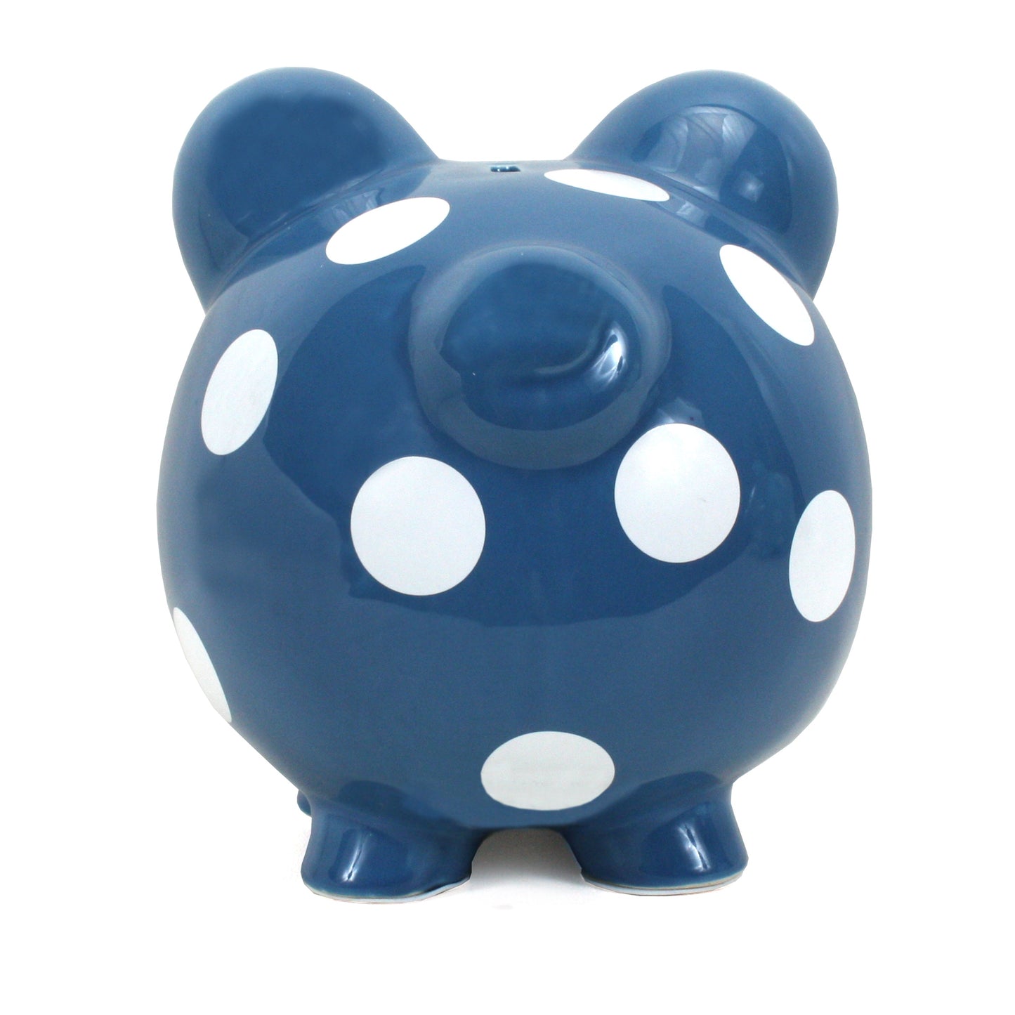 Front view of dark blue polka dot piggy bank with coin slot on top