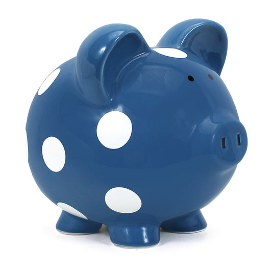 Dark blue ceramic piggy bank with white polka dots angled left view