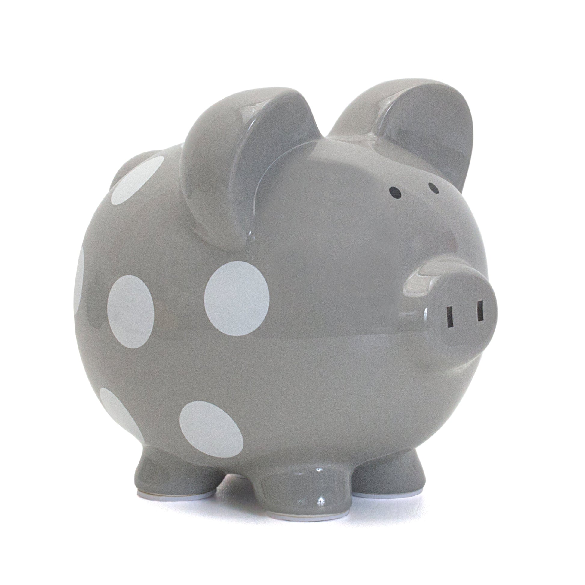Gray ceramic piggy bank with white polka dots side view