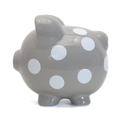 Close-up of gray ceramic piggy bank from front showing snout and feet