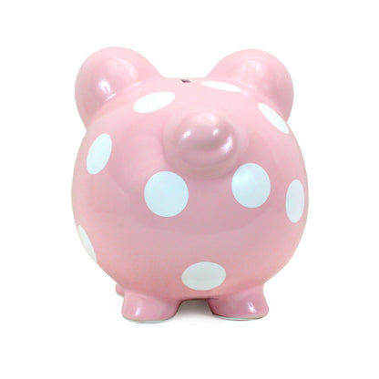 Back view of pink piggy bank with evenly spaced white polka dots