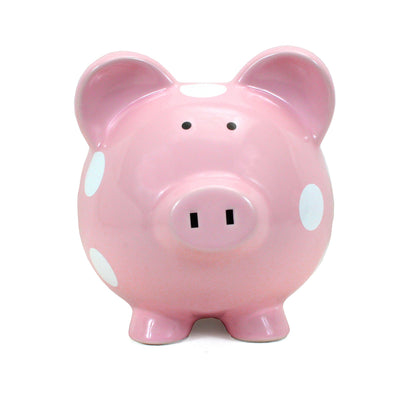 Front view of pink piggy bank with black eyes and snout coin slot