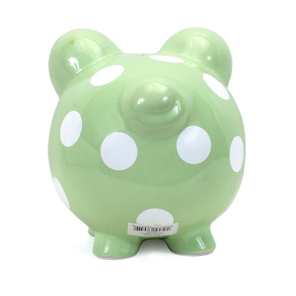 Back view of sage piggy bank showing barcode sticker and polka dot pattern