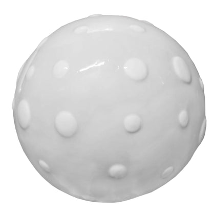 Close-up top view of gray mushroom cap with embossed polka dots on ceramic piggy bank