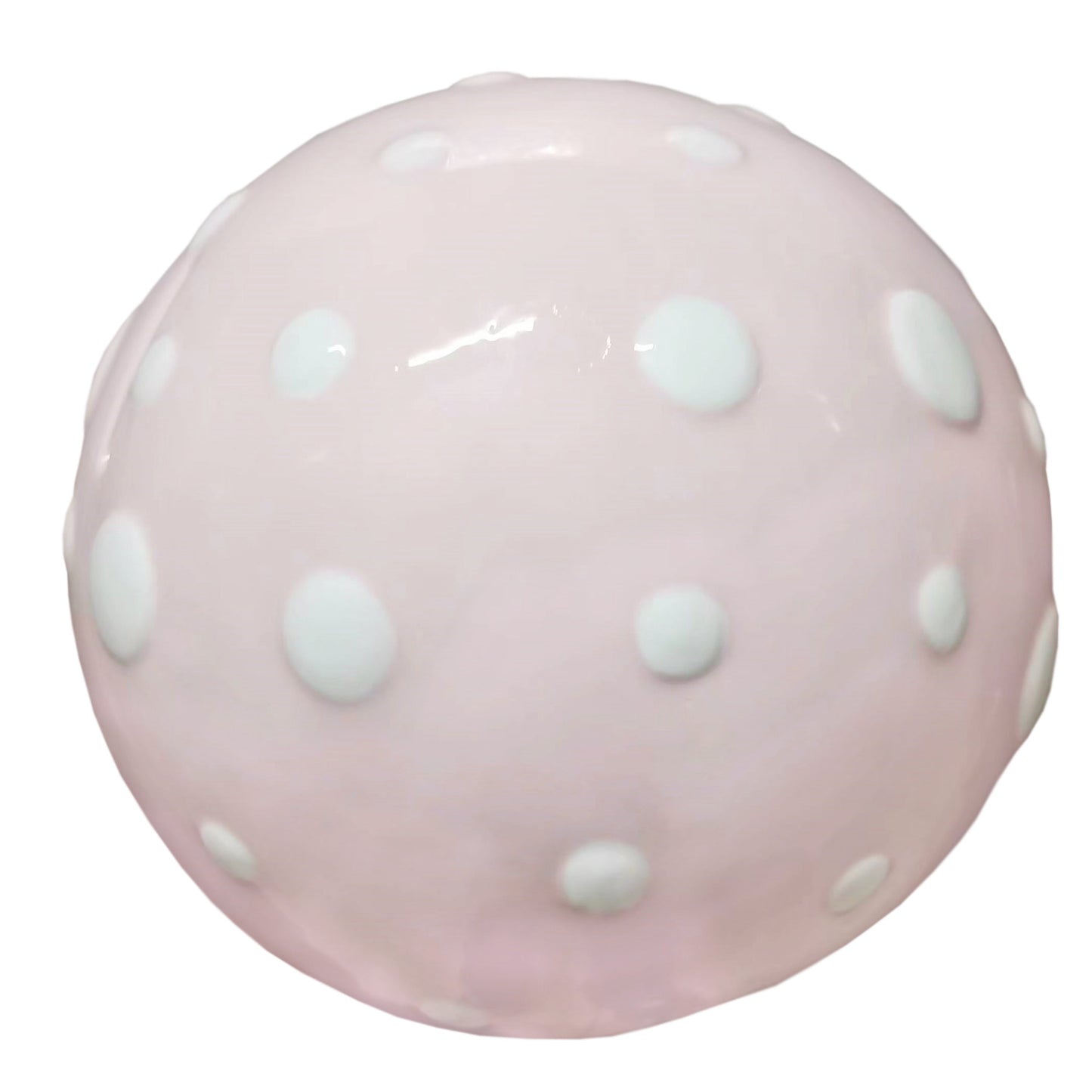 Top view showing pink mushroom cap covered with raised white polka dots on ceramic piggy bank