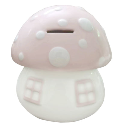 Back view of the handpainted mushroom bank with coin slot on top and pink polka-dot cap