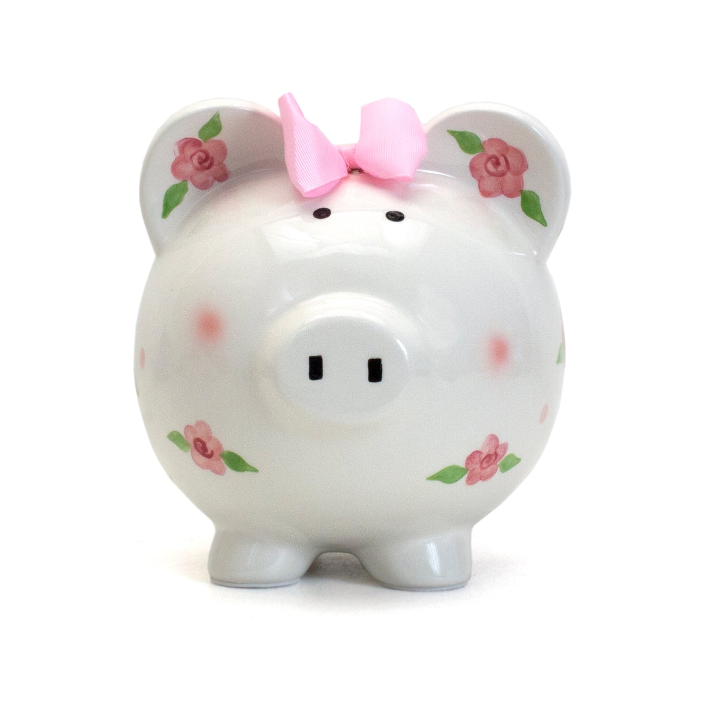 Front view of white ceramic piggy bank featuring pink floral pattern with blush cheeks and ribbon bow
