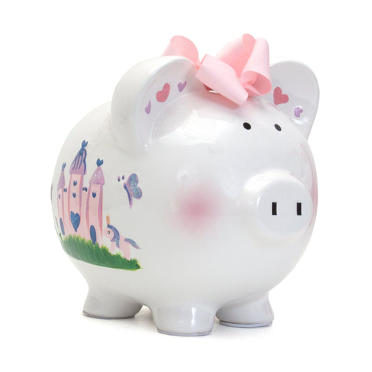 Front view of princess castle piggy bank with pink bow and handpainted castle image