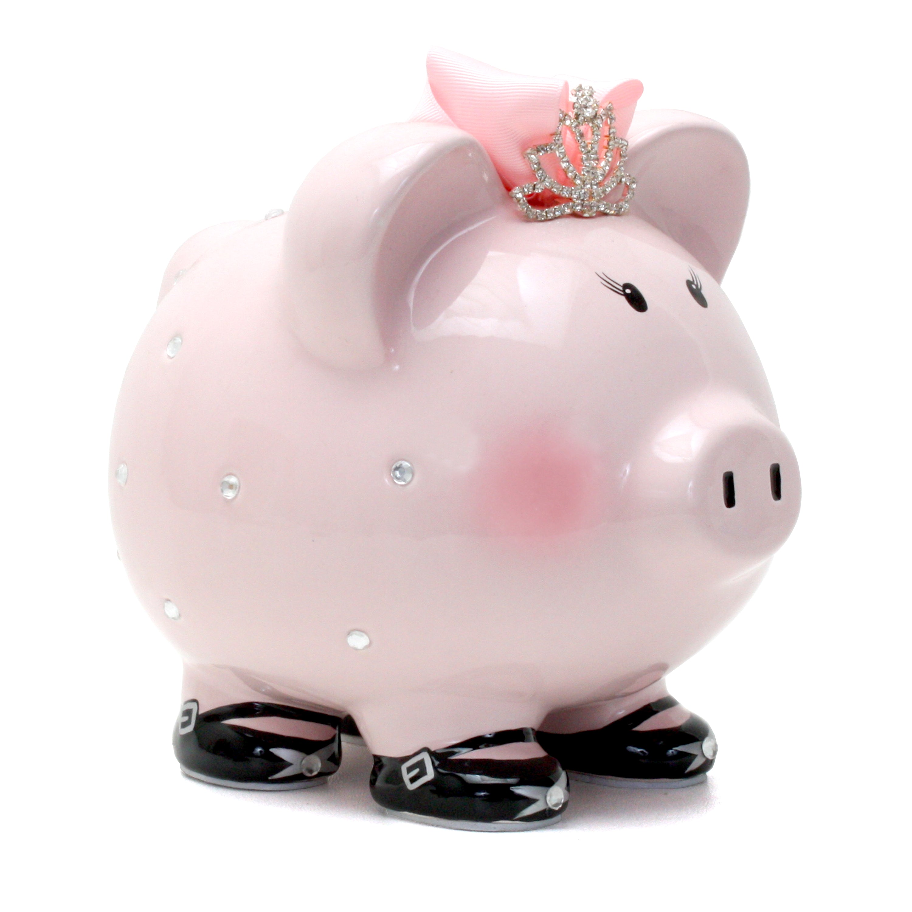 Side view of pink princess piggy bank with rhinestones and black shoes