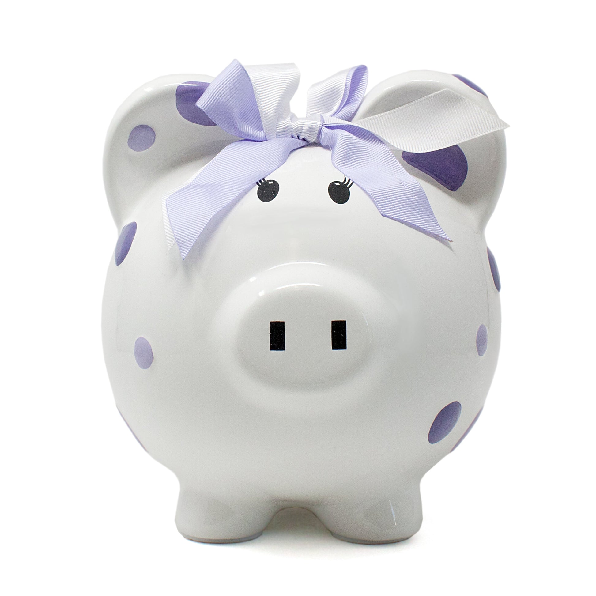 Front view of white ceramic piggy bank with purple polka dots and lavender white bow on ear