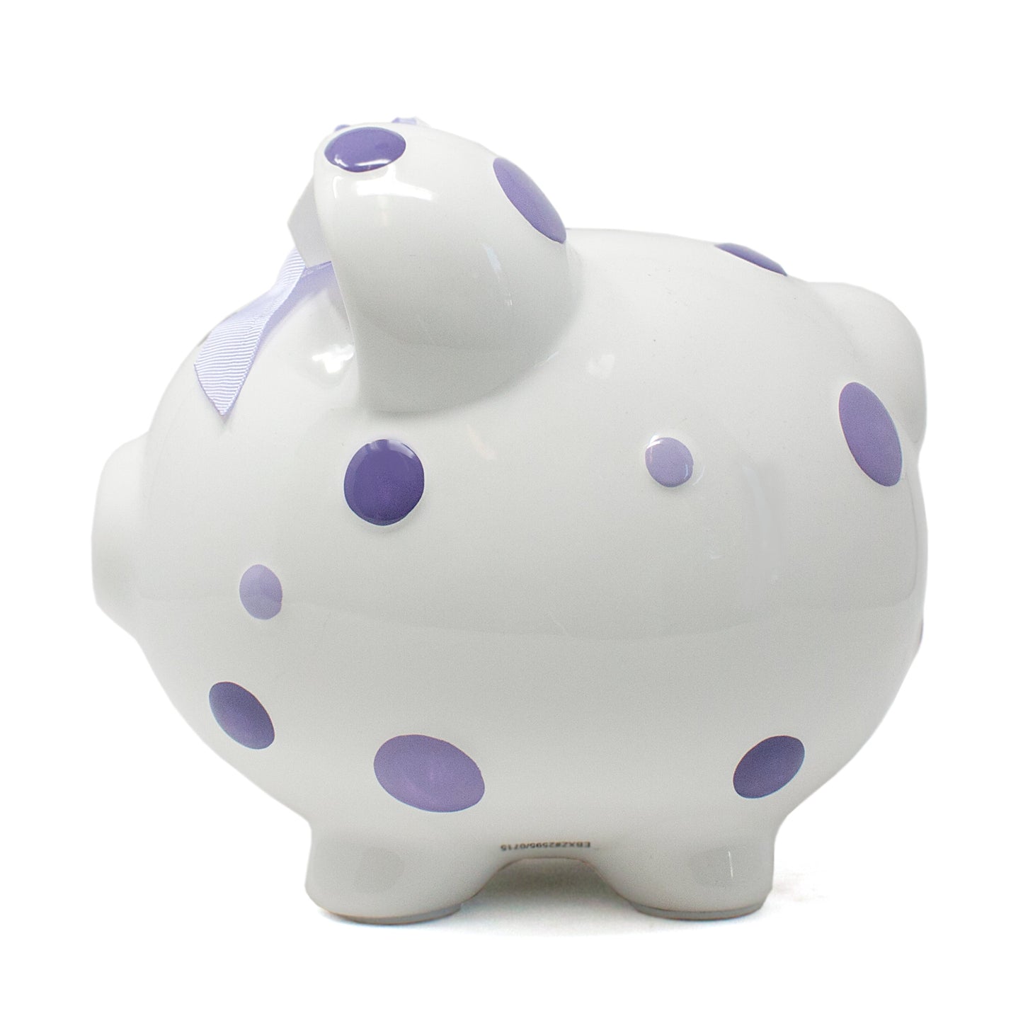 Right side view of white ceramic piggy bank featuring purple polka dots