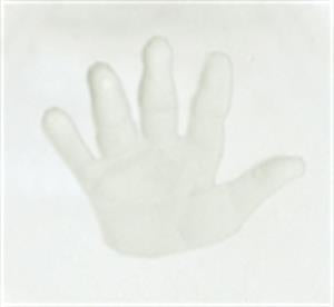 white plaster handprint mold showing detailed fingers and palm texture on a smooth surface
