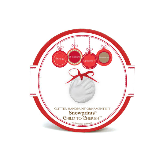 Snowprint glitter handprint ornament kit package featuring red and white circular design with handprint ornament image and red ribbon