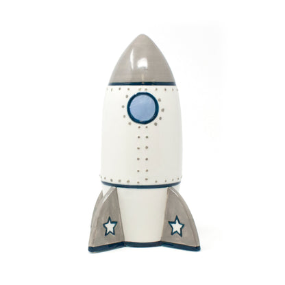 Side view of Roger Rocket ceramic bank showing star-decorated gray fins
