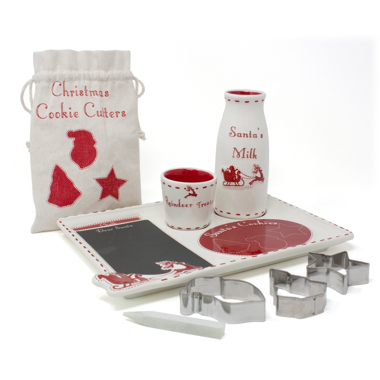 Close-up of Santa's Cookie Platter set showing chalkboard, cookie cutters, milk bottle and red and white fabric pouch