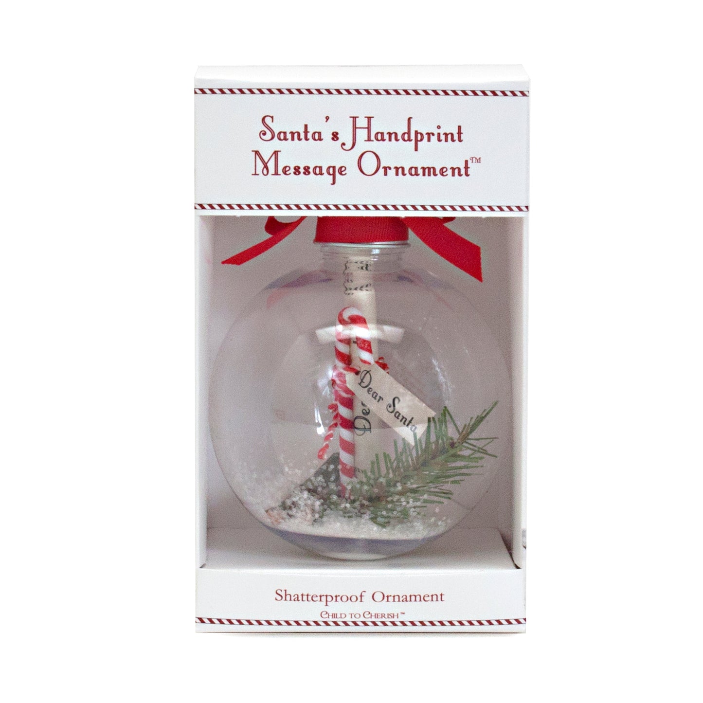 Clear ornament displayed with internal keepsake including 'Dear Santa' message and festive decorations