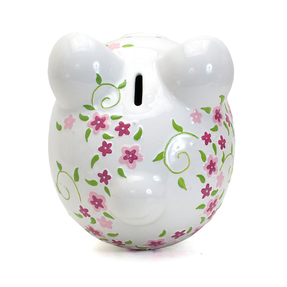 Left side view of floral shabby chic piggy bank with delicate flower pattern