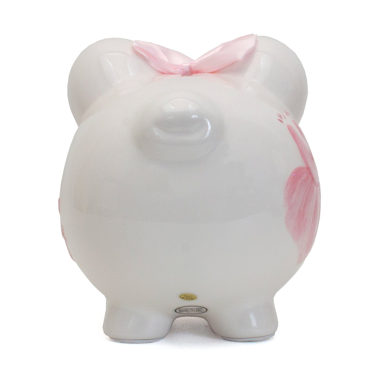 Bottom view highlighting labels and stable feet of handpainted piggy bank
