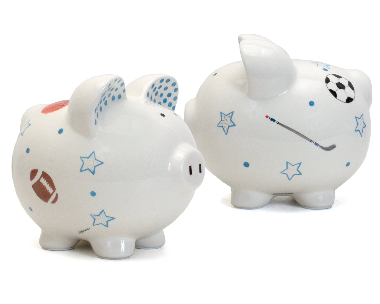 Two piggy banks side by side showing detailed handpainted sports themed artwork