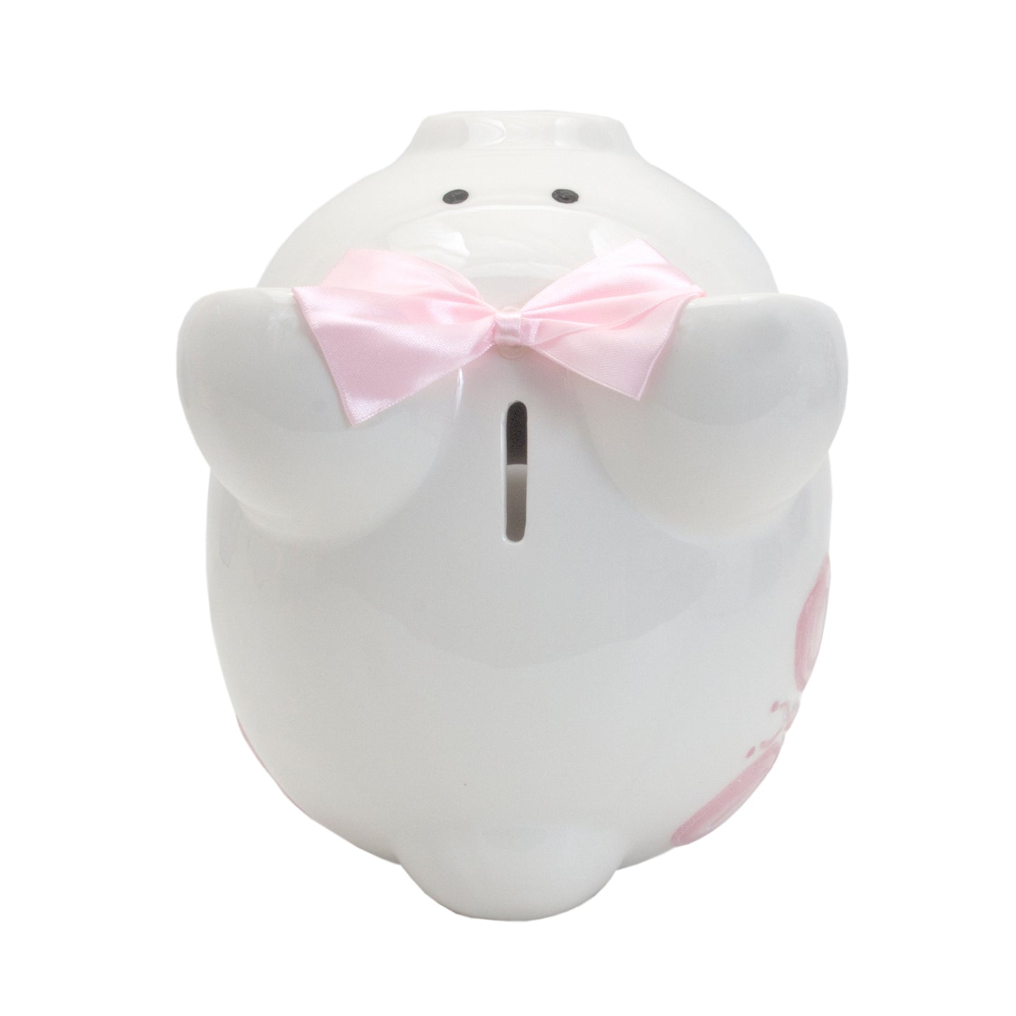 Back view of piggy bank revealing handpainted pink heart design