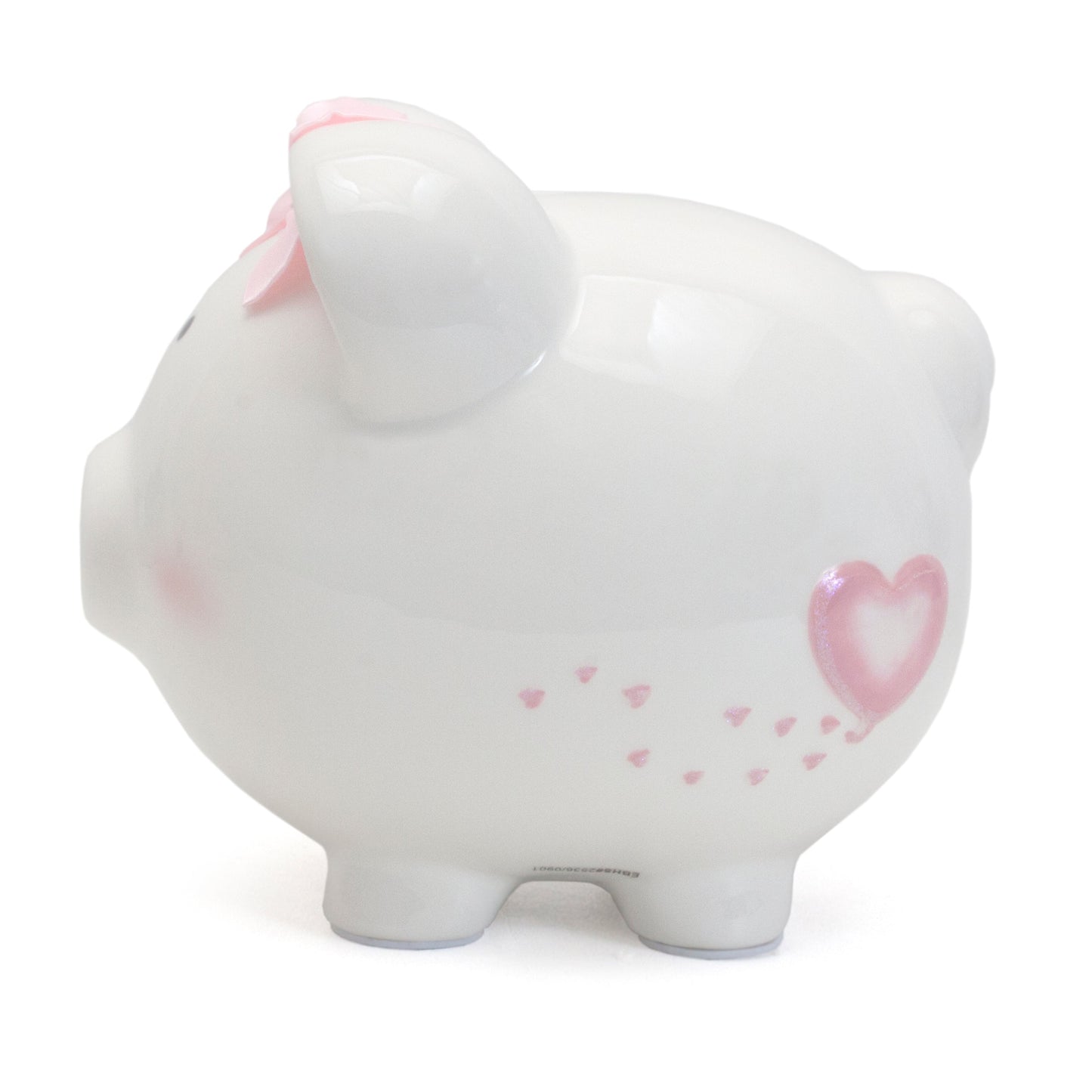 Top view of piggy bank showing coin slot and satin bow on ear