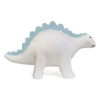 Left side profile showing handpainted blue ridges and spots on the ceramic piggy bank
