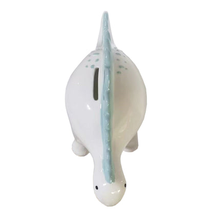 Top view showing coin slot and blue ridges on the back of dinosaur piggy bank
