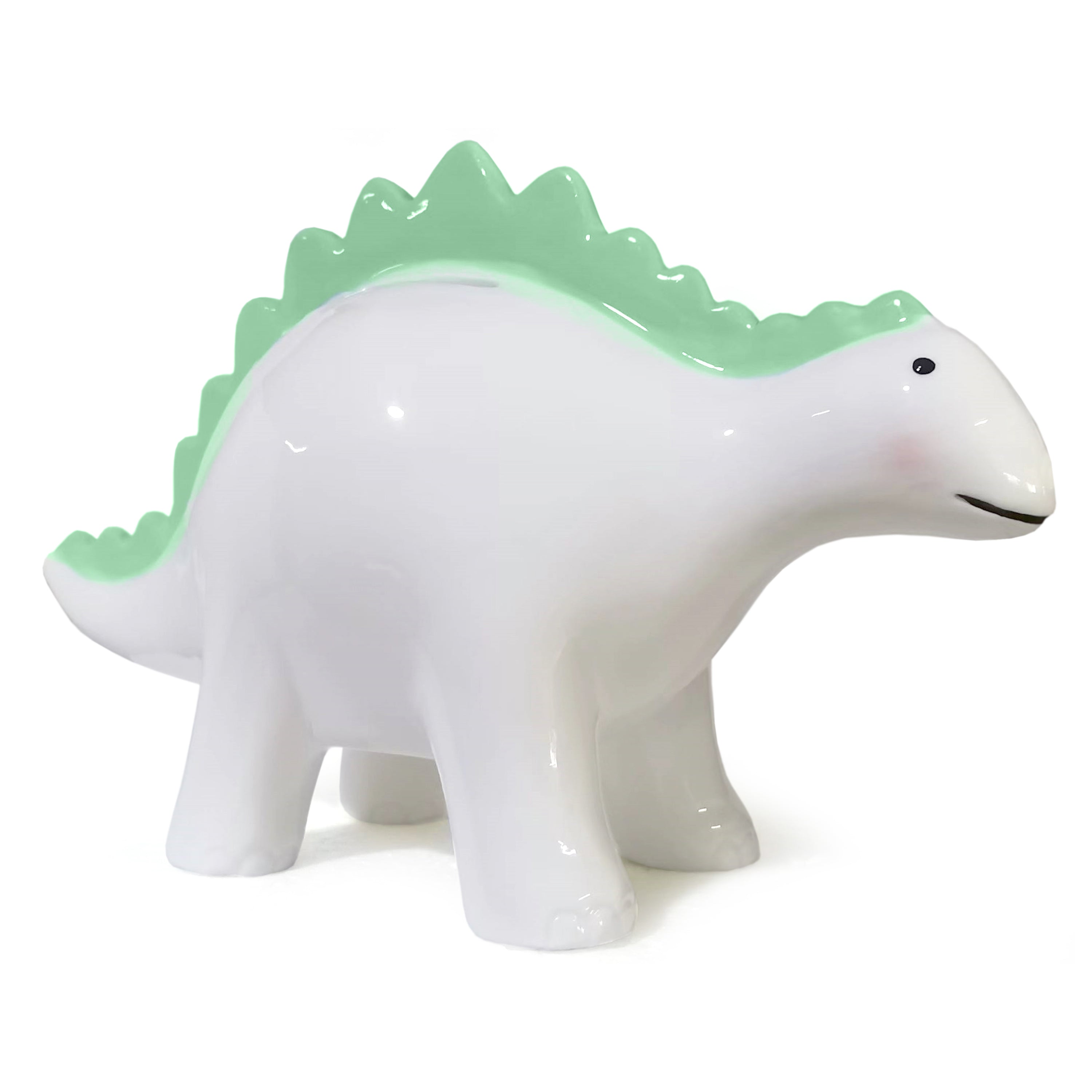 Side view of Theo the Dinosaur green ceramic piggy bank showing smooth white body and green spikes
