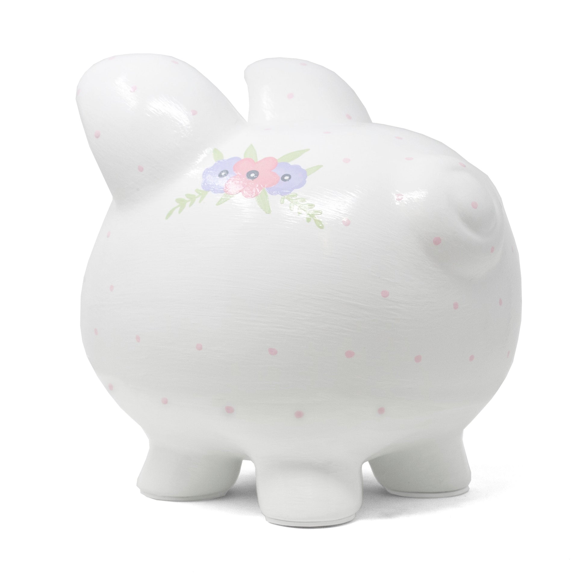 Side view of piggy bank featuring floral patterns on the ear and body