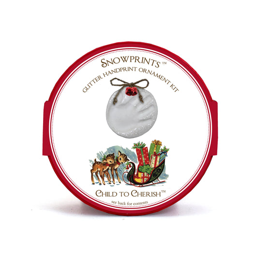 Snowprint glitter handprint ornament kit package with vintage design featuring a white handprint ornament accented with red bells