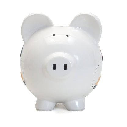 Front view of white piggy bank with handpainted blue, yellow, and red construction trucks