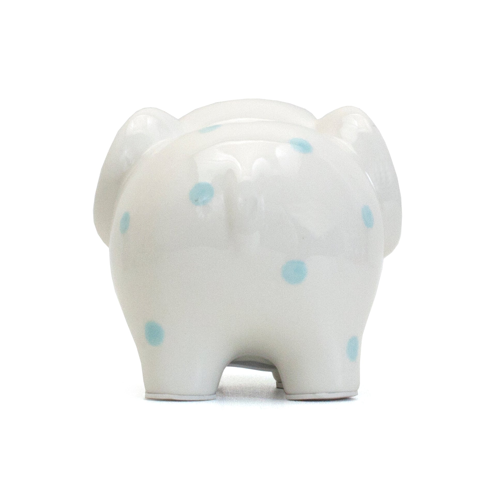 Angled side view of white ceramic elephant piggy bank