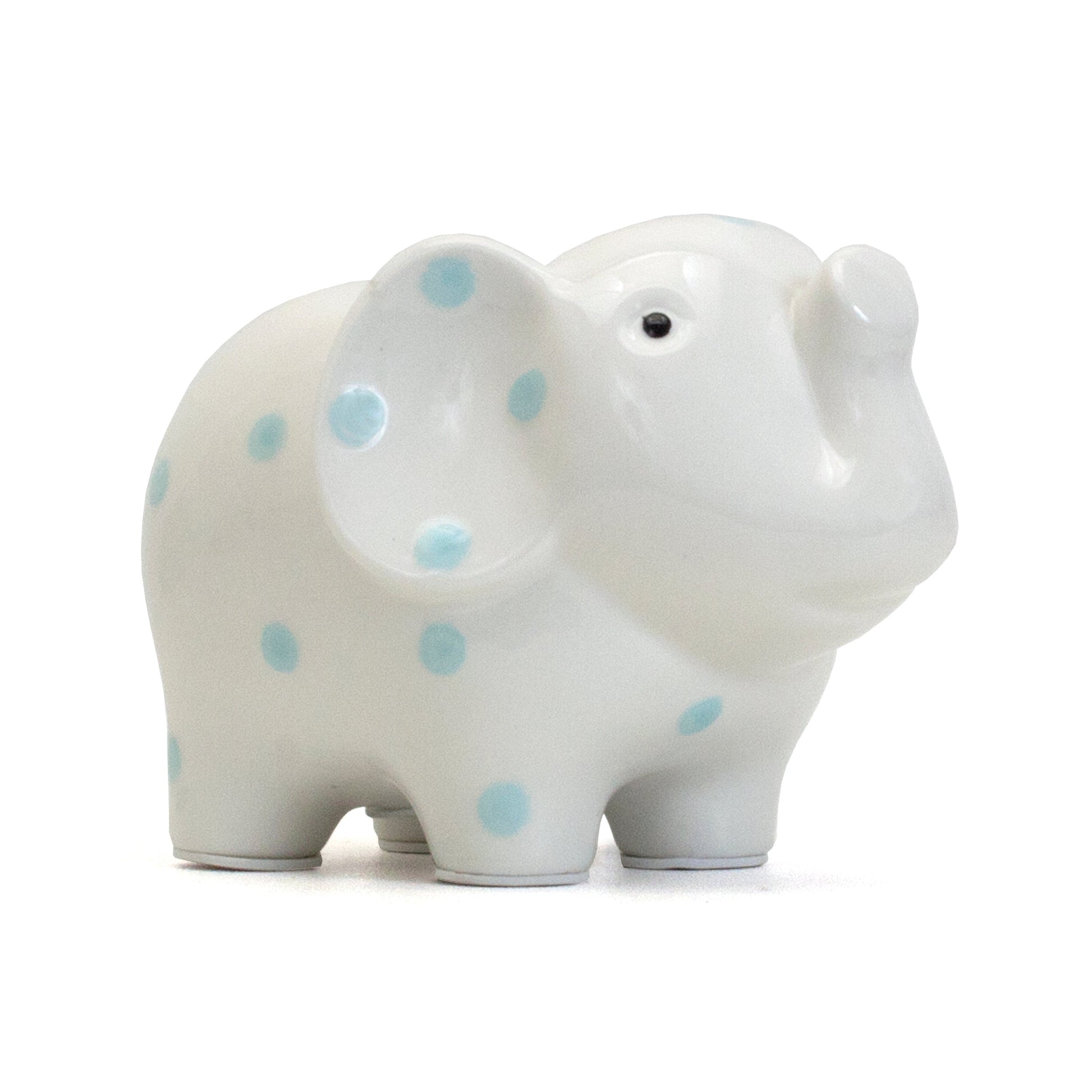 White ceramic elephant piggy bank with blue polka dots side view
