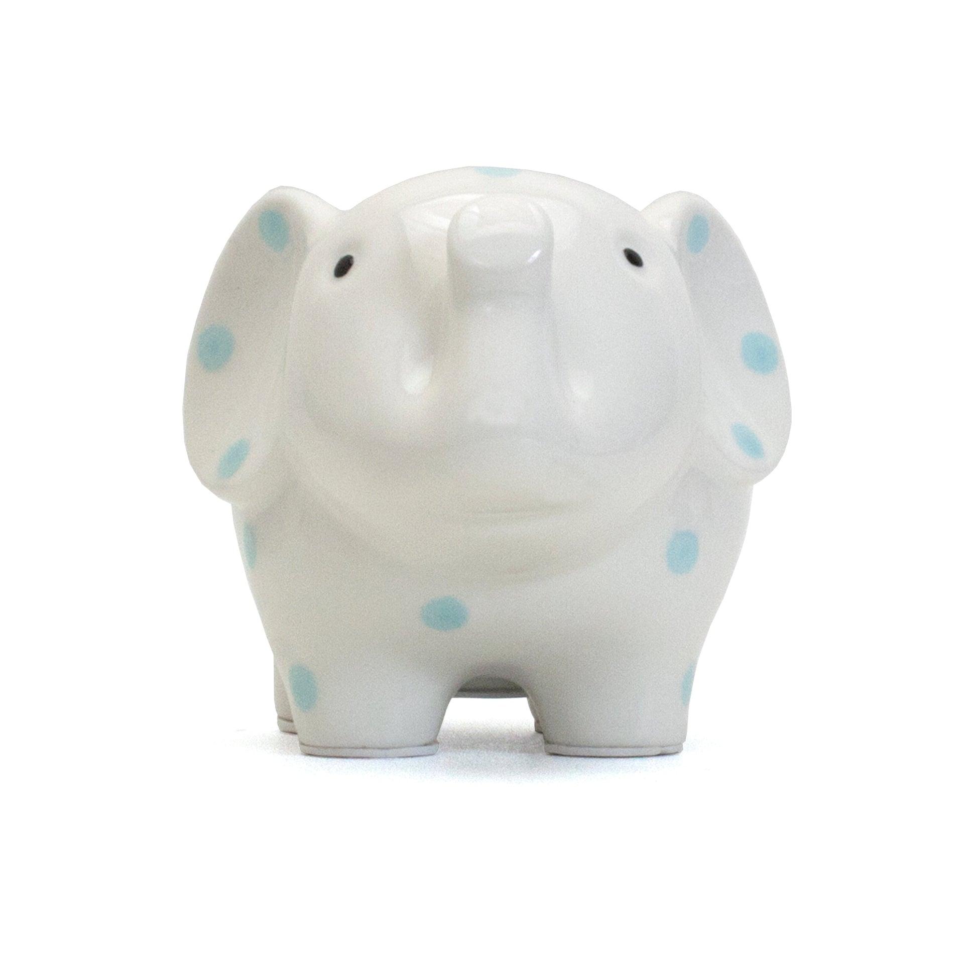 Front view of white elephant piggy bank with blue polka dots