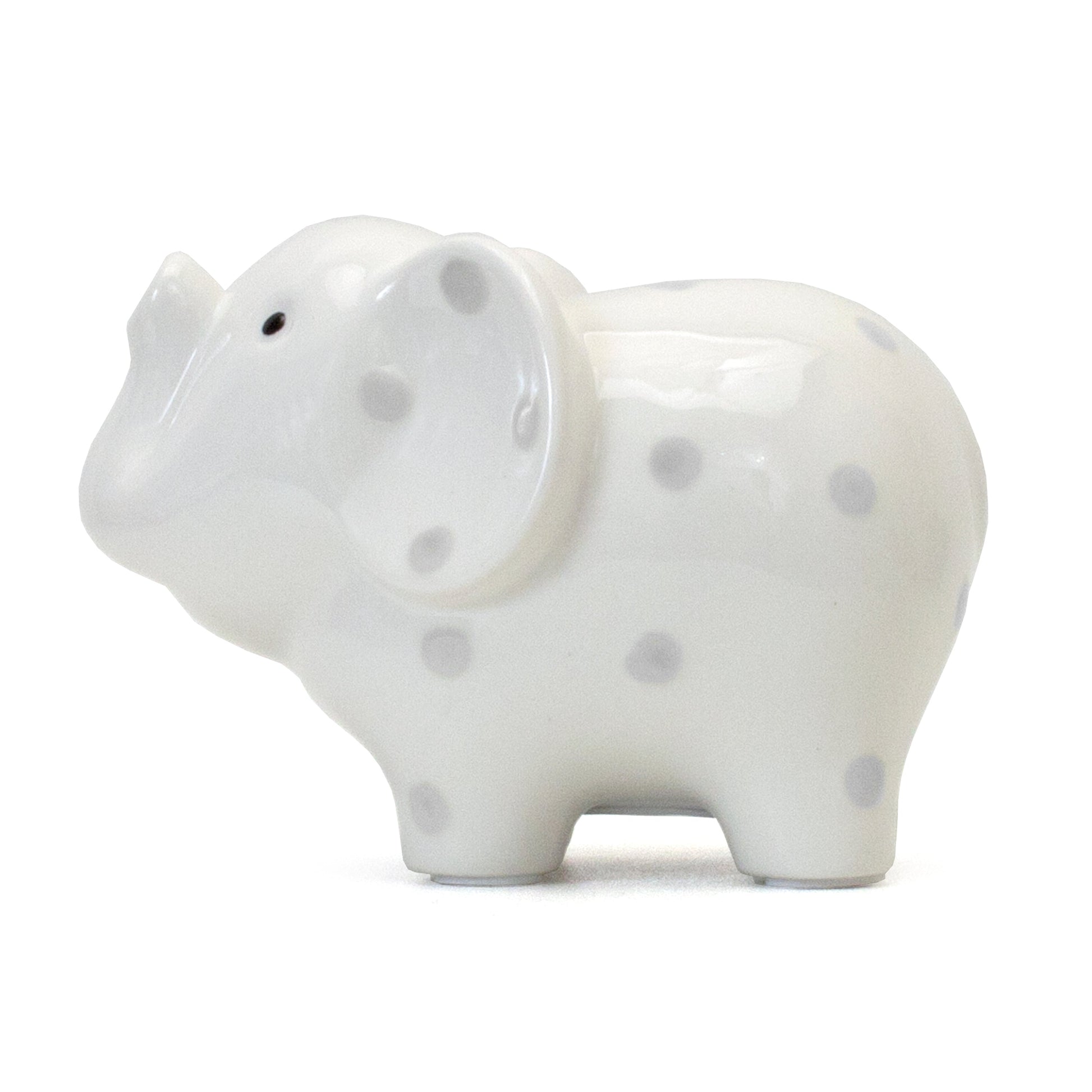 Top view of white elephant piggy bank showing coin slot