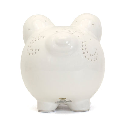 Bottom view of white ceramic piggy bank with label