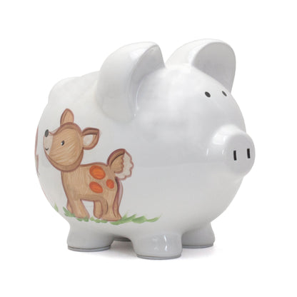Front side of white ceramic piggy bank with handpainted deer illustration